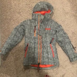 Marker snowboarding jacket. Gray outside with orange interior